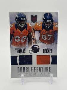 lot 413 image: 2013 Panini Momentum - Double Feature Materials Demaryius Thomas and Eric Decker Prime Game Used Jersey Card Serial #d 13149