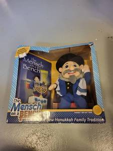 lot 208 image: The Mensch on a Bench Plush Doll with Hardcover Storybook in Box