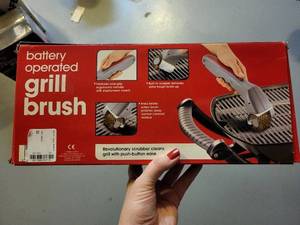 lot 239 image: Grill Accessory Set with Battery Operated Grill Brush, Skewers, and Aluminum Foil