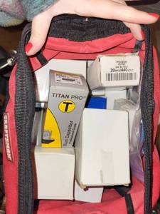 lot 311 image: Craftsman Bag with Assorted Run Capacitors - Titan Pro and Packard