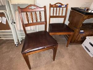 lot 21 image: Pair of Wooden Dining Chairs with Brown Vinyl Seats
