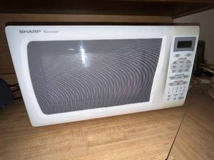 lot 39 image: Sharp Carousel Microwave Oven Model R-320E with Turntable and Manual