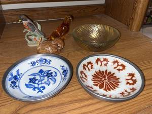 lot 123 image: Decorative Plates and Figurines Collection including Porcelain, Glass, and Gold Leaf Bowl