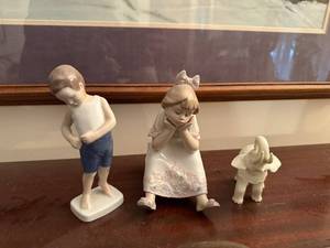 lot 96 image: Set of 3 Porcelain Figurines Boy, Girl, and Elephant by Hutschenreuther, Lladro, and Lenox