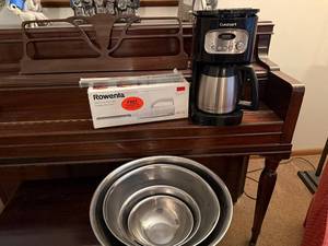 lot 99 image: Kitchen Appliance and Utensil Set with Coffee Maker, Mixing Bowls, and an Electric Knife