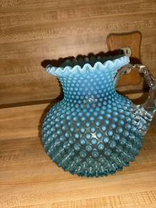lot 188 image: Blue Opalescent Hobnail Glass Pitcher with Clear Handle, 7 Inch Tall