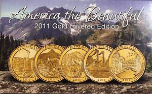 lot 14 image: 2011 Set of Gold-Plated America the Beautiful Quarters.