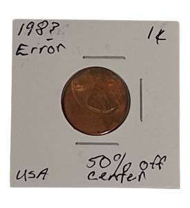 lot 31 image: 198 Error Penny 50% off Center Striker Clean Coin