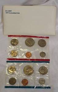 lot 42 image: 1979 Uncirculated Set from the Philadelphia and Denver Mints, which includes a dollar coin.