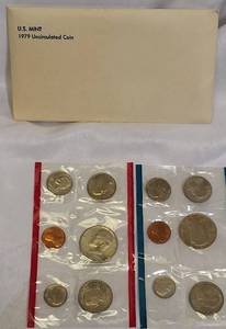 lot 43 image: 1979 Uncirculated Set from the Philadelphia and Denver Mints, which includes a dollar coin.