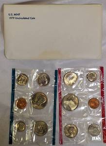 lot 45 image: 1979 Uncirculated Set from the Philadelphia and Denver Mints, which includes a dollar coin.