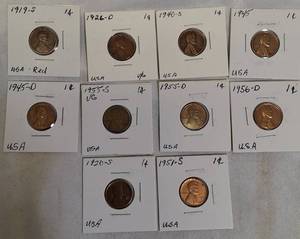 lot 54 image: Wheat pennies Perfect addition to your collection, featuring various years and mints.