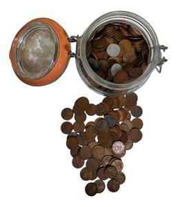 lot 57 image: Estate Wheat Pennies, Various Dates and Mint Marks, over 4 lbs. Without the jar 600 pennies.