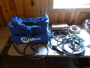lot 66 image: Miller Multimatic 215 Wire Feed Stick and TIG Welder