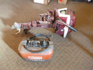 lot 103 image: Vintage Johnson Outboard Motor and Gas Tank