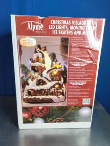 lot 11 image: Alpine Corporation 18-inch Tall Animated Winter Wonderland Set with LED Lights and Music.