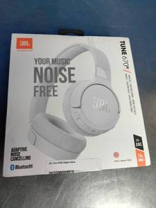 lot 29 image: JBL Tune 670NC adaptive noise cancelling wireless on-ear headphones.