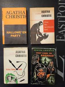 lot 201 image: Vintage Paperback Editions of Four Mystery Novels by Agatha Christie