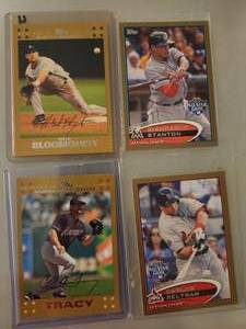 lot 186 image: 4 Topps Baseball Cards