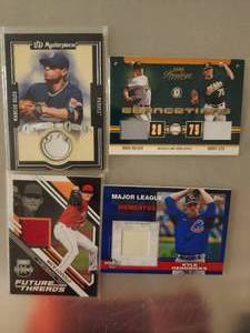 lot 181 image: 4 Topps Jersey Cards
