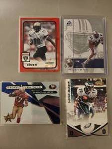 lot 175 image: Four Football Trading Cards.
