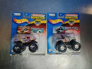 lot 48 image: Hot Wheels Monster Jam 164 scale die-cast toy trucks.