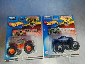 lot 49 image: Hot Wheels Monster Jam 164 scale die-cast toy trucks.