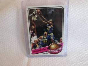lot 14 image: 1979-80 Topps Robert Parish Card...