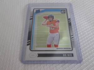 lot 79 image: 2024 Optic Bo Nix Rookie Card...