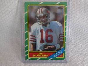 lot 184 image: 1986 Topps Joe Montana Card...