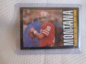 lot 257 image: 1985 Topps Joe Montana Card...