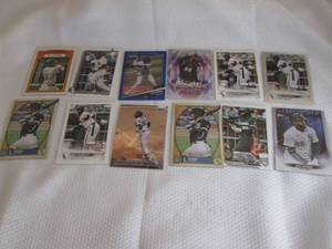 lot 310 image: Assorted Luis Robert Cards...