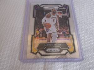lot 394 image: 2023-24 Prizm Lebron James Card...