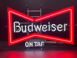 lot 14 image: Budweiser on Tap, Bud bowtie neon
