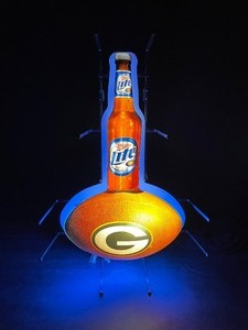 lot 19 image: Miller Lite Green Bay Packers, NFL, neon illuminated 3D bottle and football