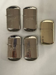 lot 157 image: Lot of 5 Camel Cigarettes lighters