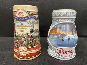 lot 192 image: Lot of 2 Limited Edition ceramic beer steins 1997 Coors and Miller High Life Great American Achievements