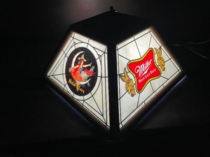 lot 231 image: Miller High Life hanging lamp from Nyes Polonaise Room