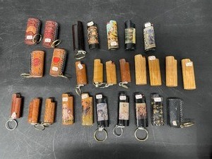 lot 159 image: Box of stylish lighter covers