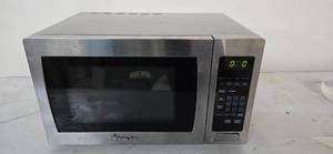 lot 10 image: Magic Chef Microwave with a dimension of 14L x19W x 10H Used from a shutdown hotel