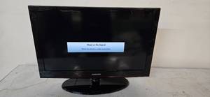 lot 14 image: Samsung TV 24 W Used from a shutdown hotel