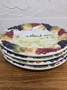 lot 8 image: 4 plates with raised fruit