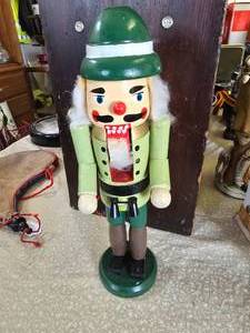 lot 48 image: Muzzloader patches and nutcracker