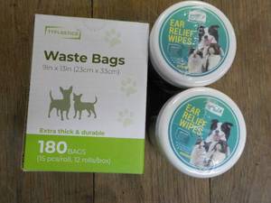 lot 74 image: 180 Pet Waste bags and Ear Relief W...