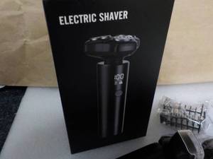 lot 82 image: Electric Shaver...