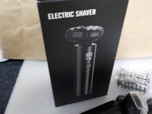 lot 83 image: Electric Shaver...