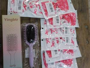 lot 98 image: Hair Brush Styling, Brush and bows...