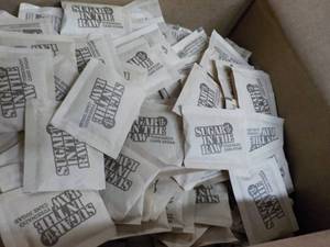 lot 138 image: Case of 1200 packets Sugar in the R...