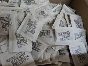 lot 139 image: Case of 1200 packets Sugar in the R...