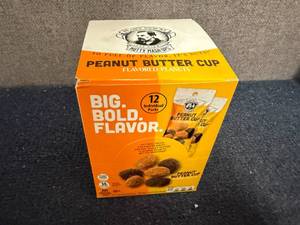 lot 212 image: 12Ct Box Of Peanut Butter Cup Flavored Peanuts